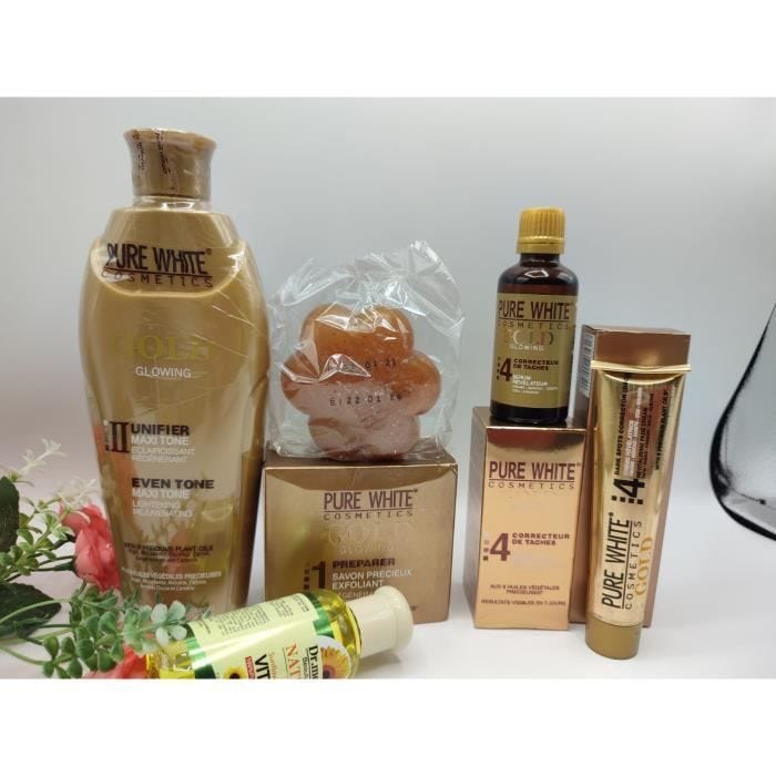 Mini gamme pure white gold lait 400ml, l'huile, savon, tube crème et serum concentré